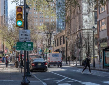 A look down a busy city street in Springtime.