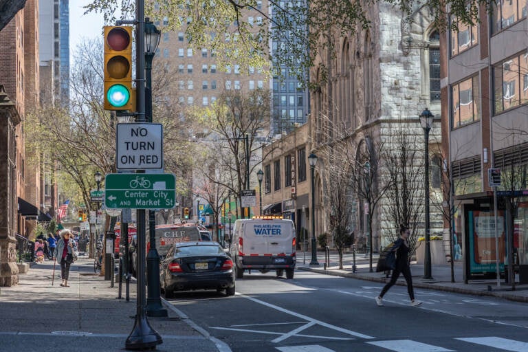 A look down a busy city street in Springtime.