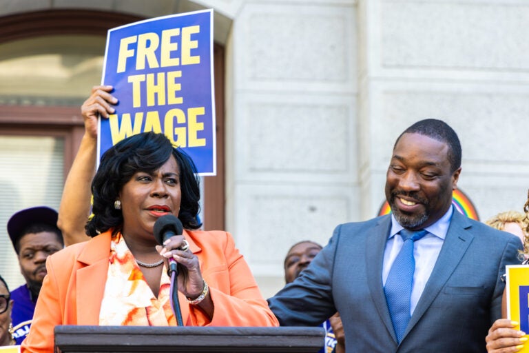 Cherelle Parker speaking at a podium at the rally