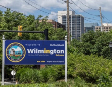 a sign reads Welcome to WIlmington