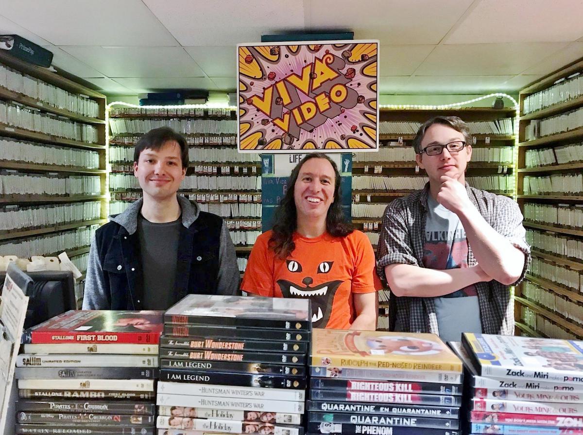Before Viva Video closed in 2021, store owner Miguel Gomez (middle), assistant manager Bryan Way (right) and clerk Dan Santelli (left) suggested little-known films to customers. (Courtesy of Bryan Way)