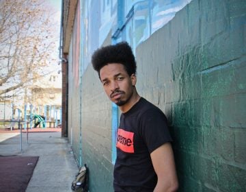 Amir Bey Richardson at Francis Myers Recreation Center, where he played as a child and where a 17-year-old boy was recently shot and killed. (Emma Lee/WHYY)