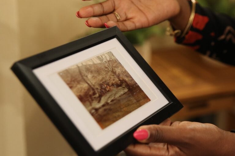 Krystal Strong holds a photo