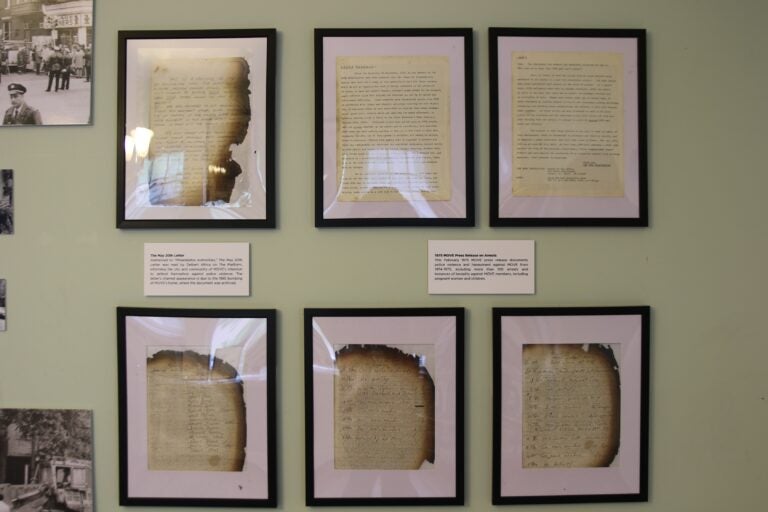 paper artifacts on a wall