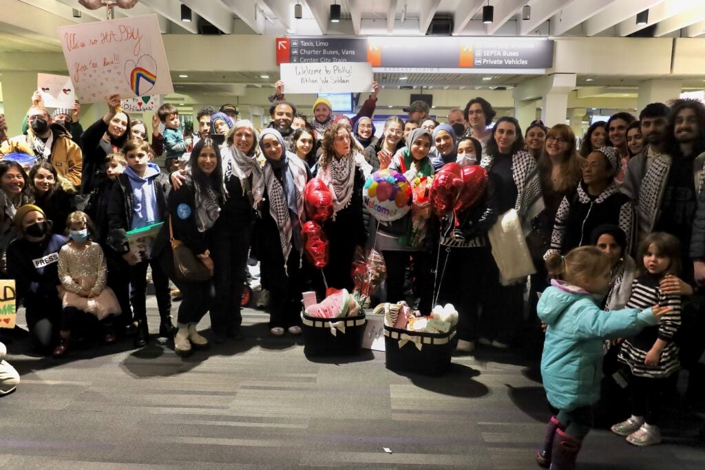 A large group photo in the airport
