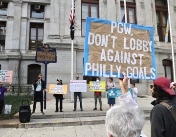 a sign reads PGW, DON'T LOBBY AGAINST PHILLY GOALS