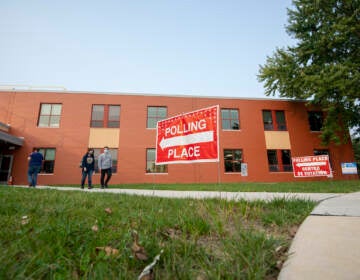 Voters outside of a building