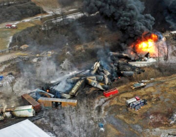 This photo taken with a drone shows portions of a Norfolk Southern freight train that derailed Feb. 3, in East Palestine, Ohio, are still on fire on Feb. 4, 2023.(AP Photo/Gene J. Puskar, File)