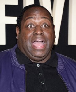 Bruce Bruce posing for a photo on the red carpet