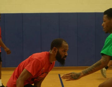 people playing in Kensington's Cure Violence basketball league