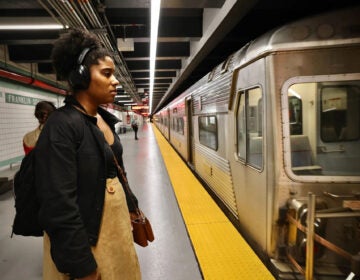 A SEPTA rider looks at the incoming train