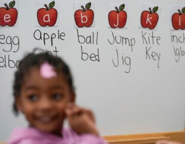 A student participates in a reading and writing lesson at a Head Start program in Florida