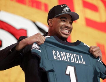 Jihaad Campbell poses after being chosen by the Philadelphia Eagles with the 31st overall pick during the first round of the NFL football draft