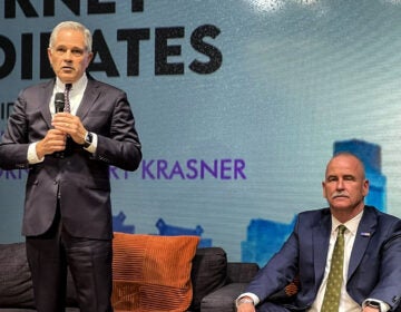 District Attorney Larry Krasner, left, and retired Municipal Court judge Patrick Dugan took part in a DA election forum.