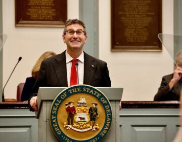 Matt Meyer speaks behind a podium