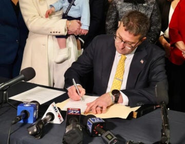 Matt Meyer signing legislation