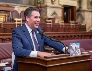 Tom Mehaffie speaking at a podium
