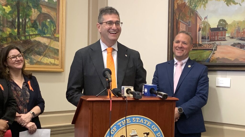 Matt Meyer speaking at a podium