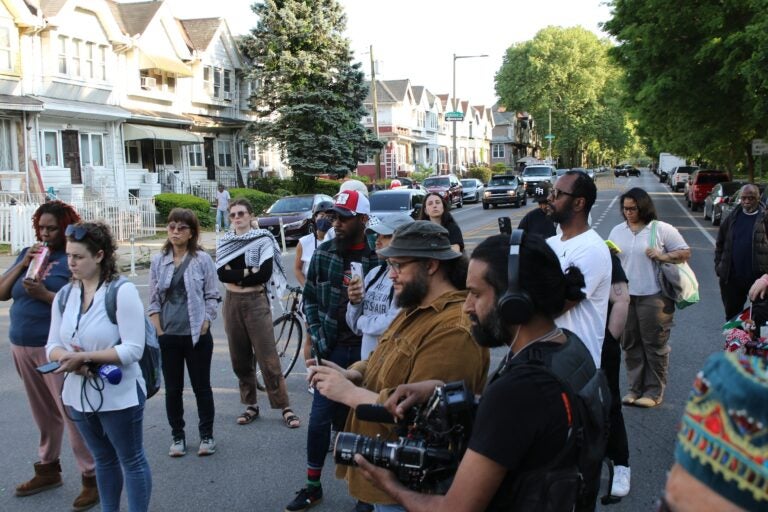 Philadelphians and loved ones of the Africa family gathered in the middle of Cobbs Creek Parkway