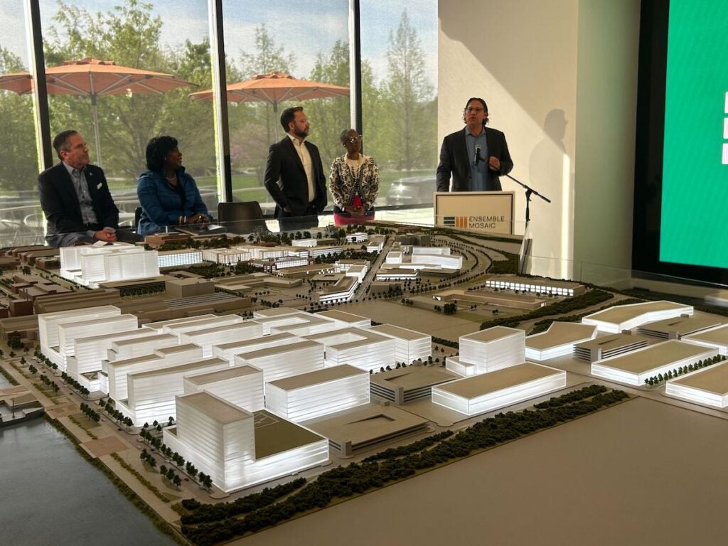 Members of the Navy Yard's development team and Mayor Cherelle Parker as Ensemble's Brian Cohen speaks about the new developments