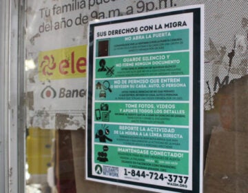 A sign in Norristown explains in Spanish your rights when interacting with immigration enforcement agents