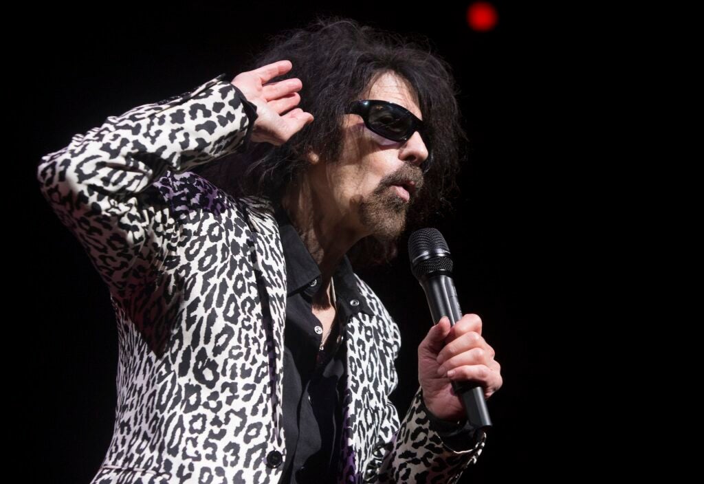 Peter Wolf performing on stage