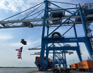 A container vessel being unloaded