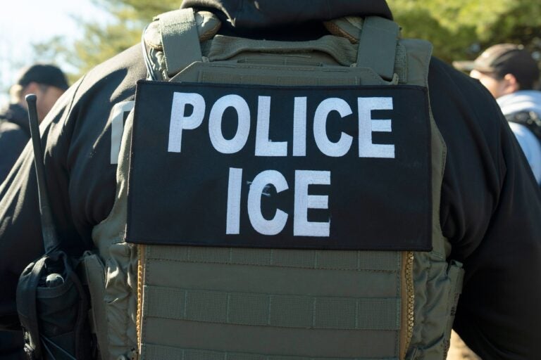 the back of A U.S. Immigration and Customs Enforcement officer