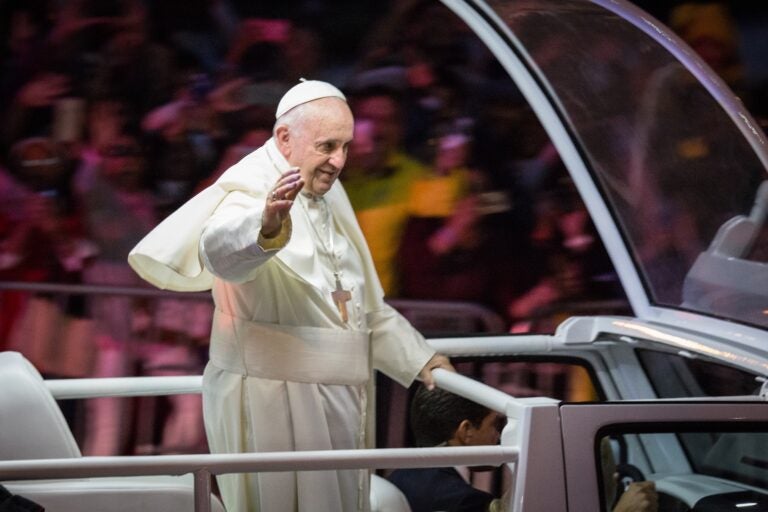 Pope Francis waves