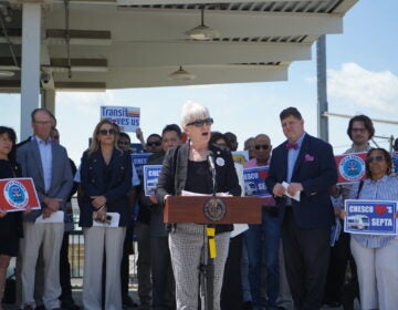 State Senator Carolyn Comitta addresses the media at Paoli Station