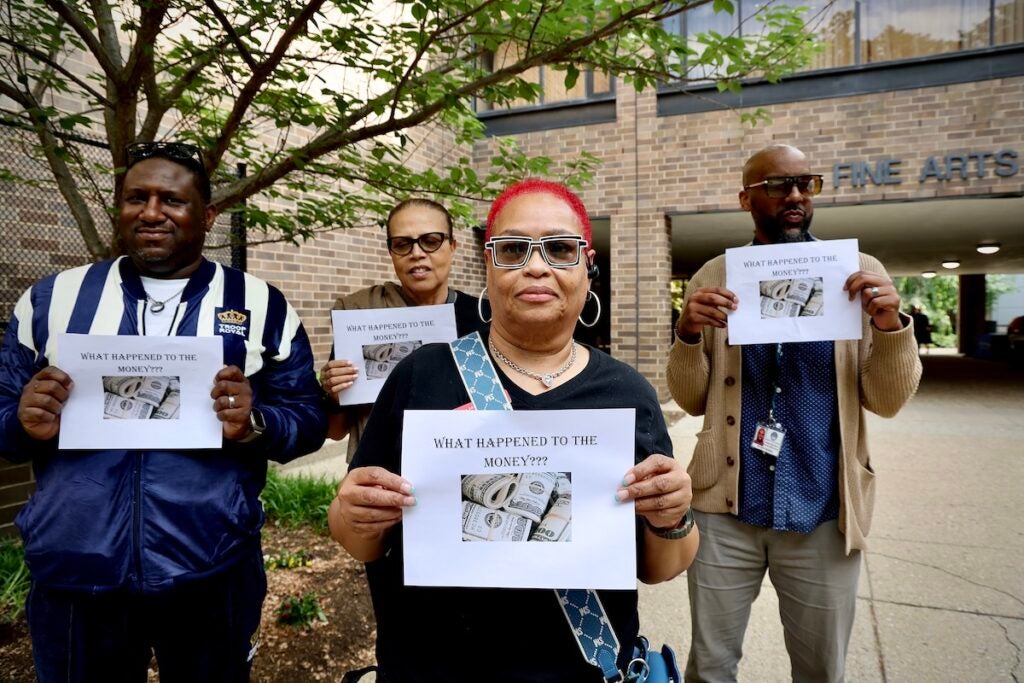 Pamela Clark and other members of the union picketing outside the Gordon theater