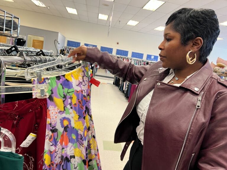 Woman observing clothing rack at B-Bop Vintage in Philadelphia