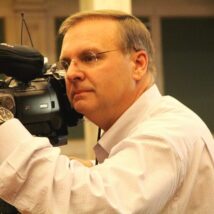 A headshot of Tom MacDonald