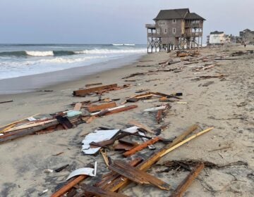 Beach house debris on the beach
