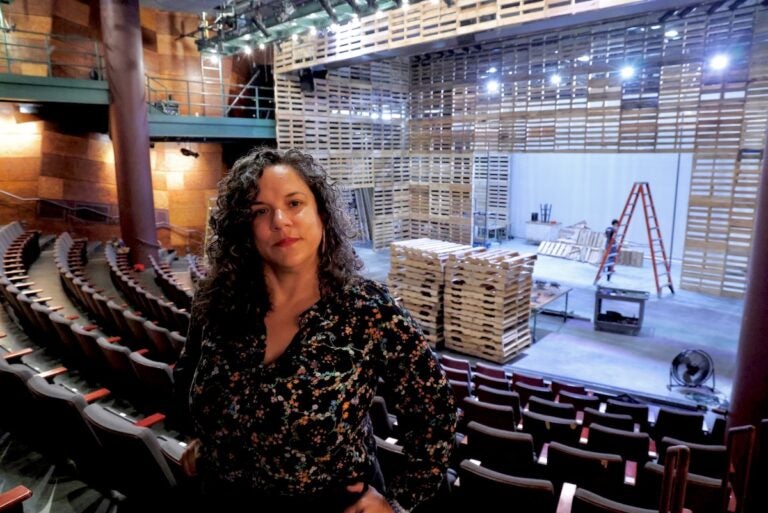 Leigh Goldenberg standing in the Wilma Theater