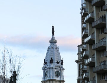 When viewing the statue atop City Hall of William Penn from the Benjamin Franklin Parkway, Penn's hand might appear to be a different sort of bodily appendage. (Conrad Benner/WHYY)