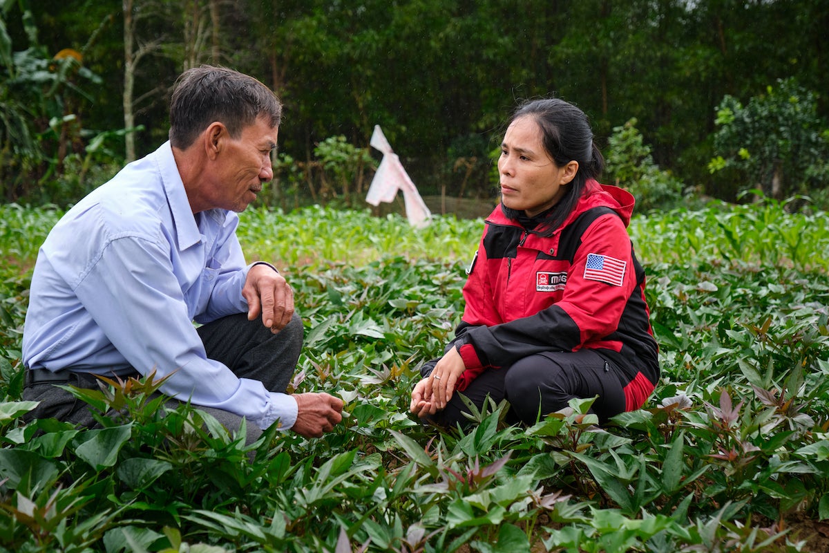Hoàng Thi Mai Chi (right) works for the Mines Advisory Group, an international nonprofit organization that assists people affected by landmines, unexploded ordnance, and small arms and light weapons. (Mines Advisory Group/Bart Verweij)
