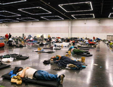 People resting inside a cooling station