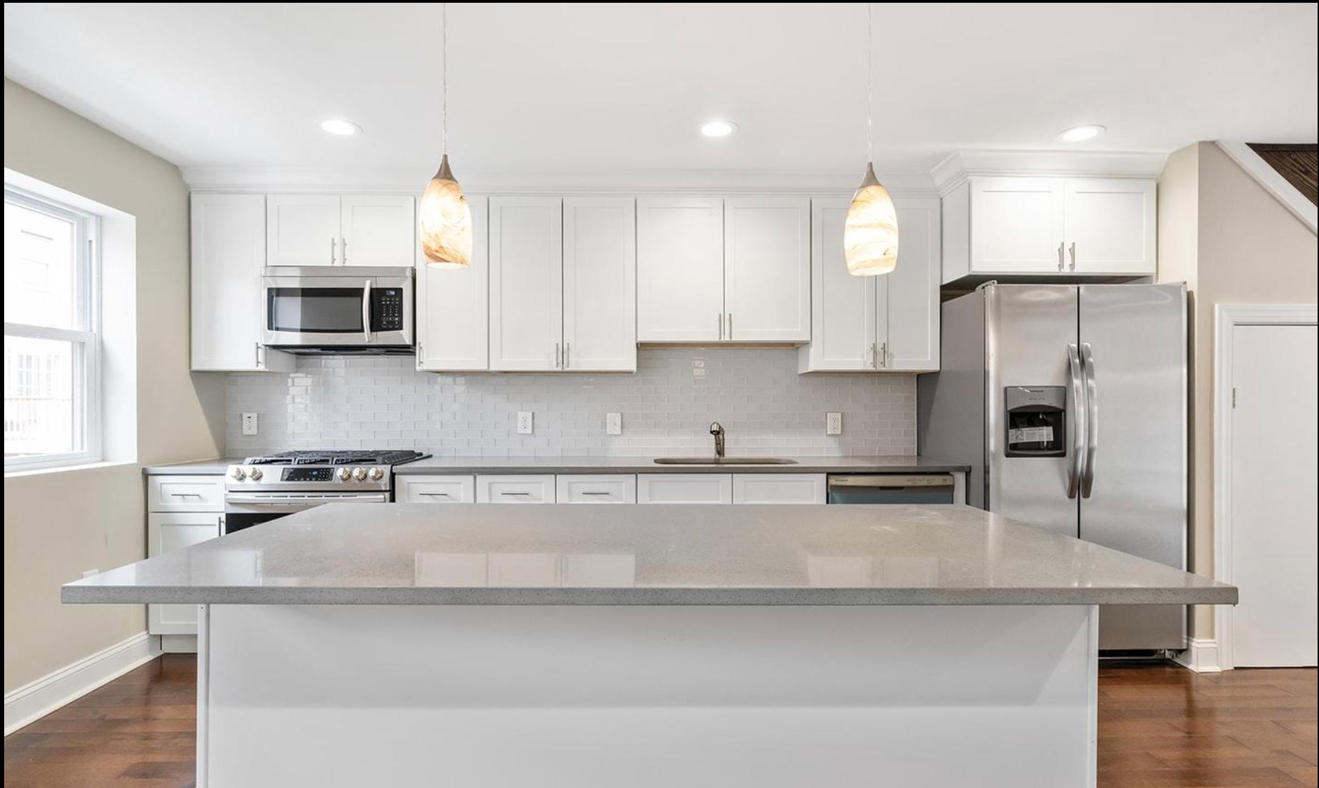 A photo of the newly renovated kitchen in 6225 Osage Ave.